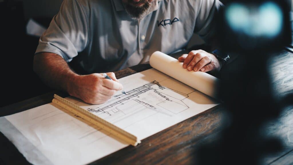 Construction worker drafting an Avetta Safety Program for their contractor job.